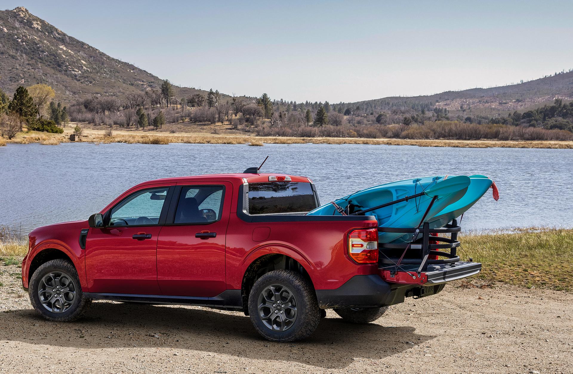 2026 Ford Maverick with kayaks secured in the FLEXBED cargo box near a lake