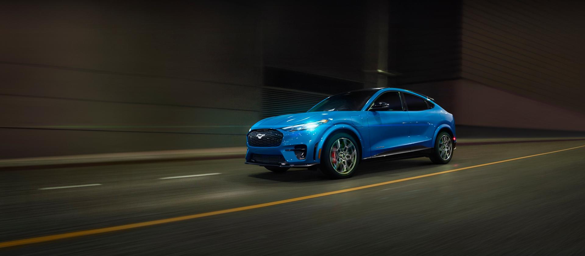 2026 Ford Mustang Mach-E electric SUV driving at speed