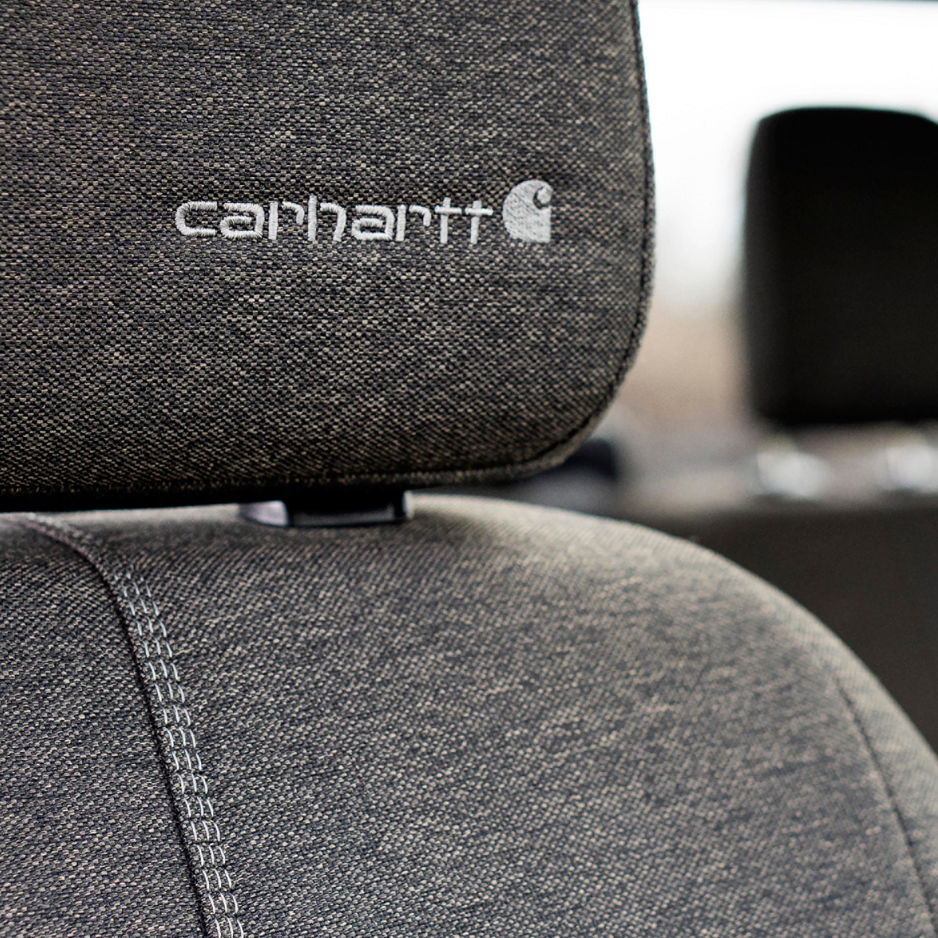 Close up of passenger seat headrest with embroidered Carhartt® logo