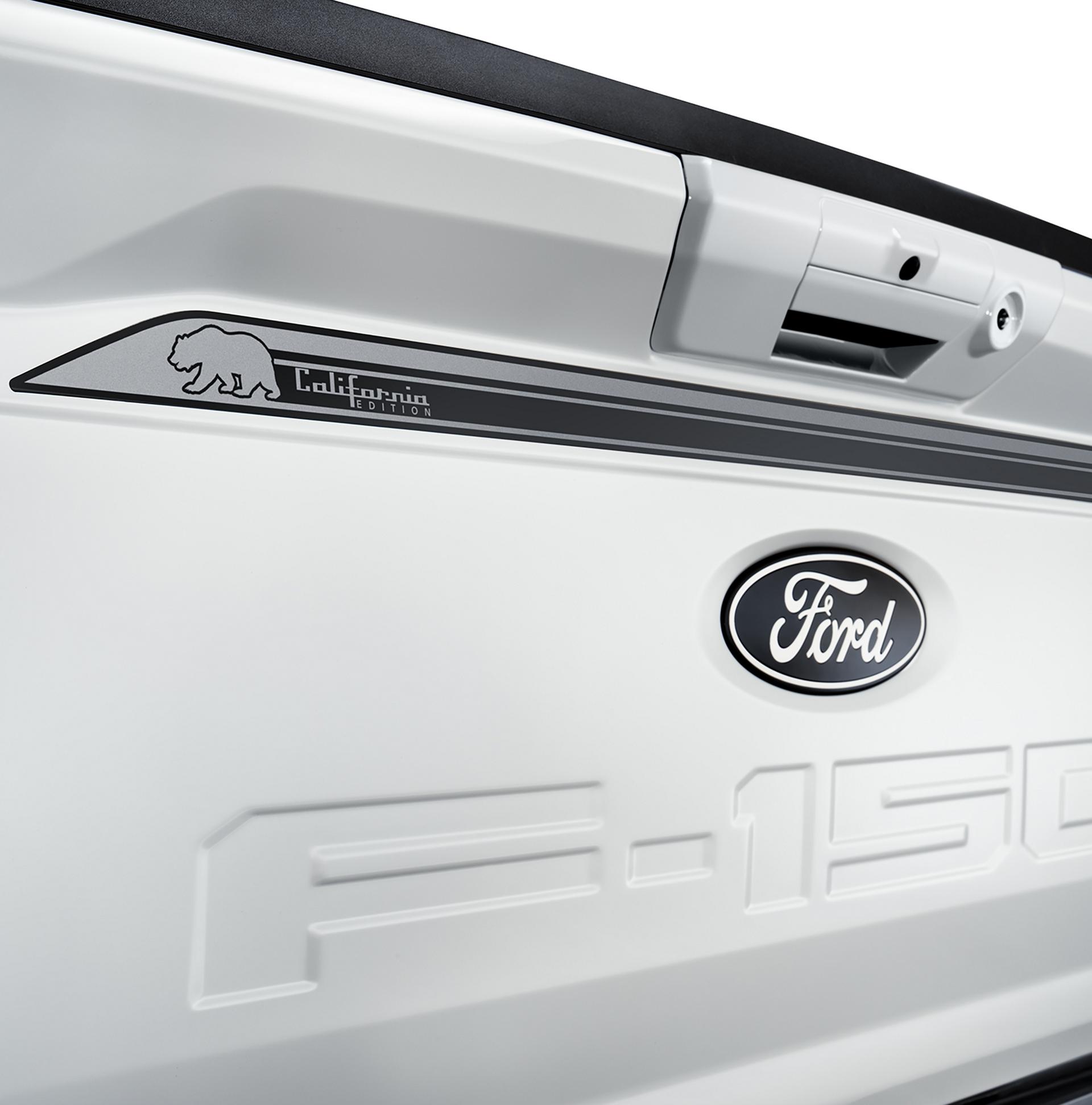 Close-up of the tailgate graphic on a white Ford F-150® truck