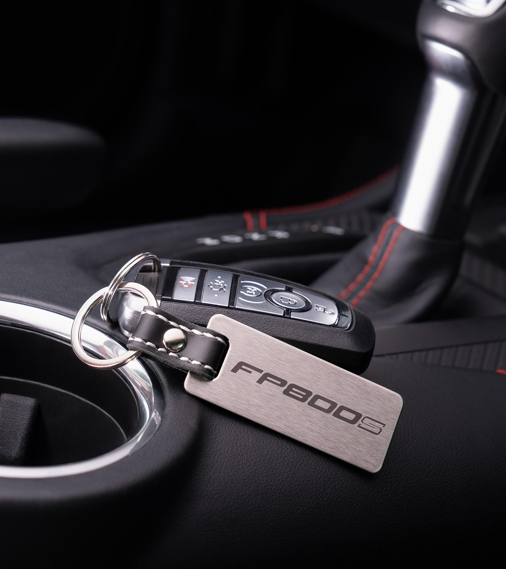Brushed FP800S keychain with the Mustang key fob on the center console
