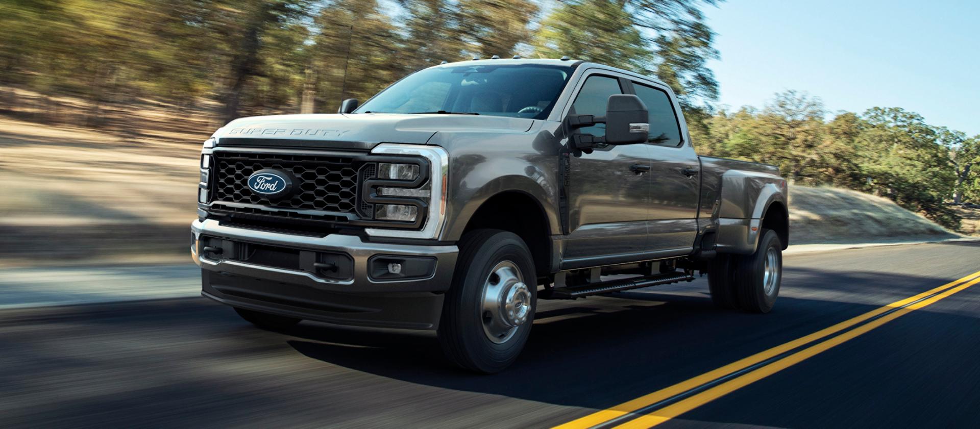 2027 Ford Super Duty® F-250® XL model with the STX® Appearance Package driving on a paved road