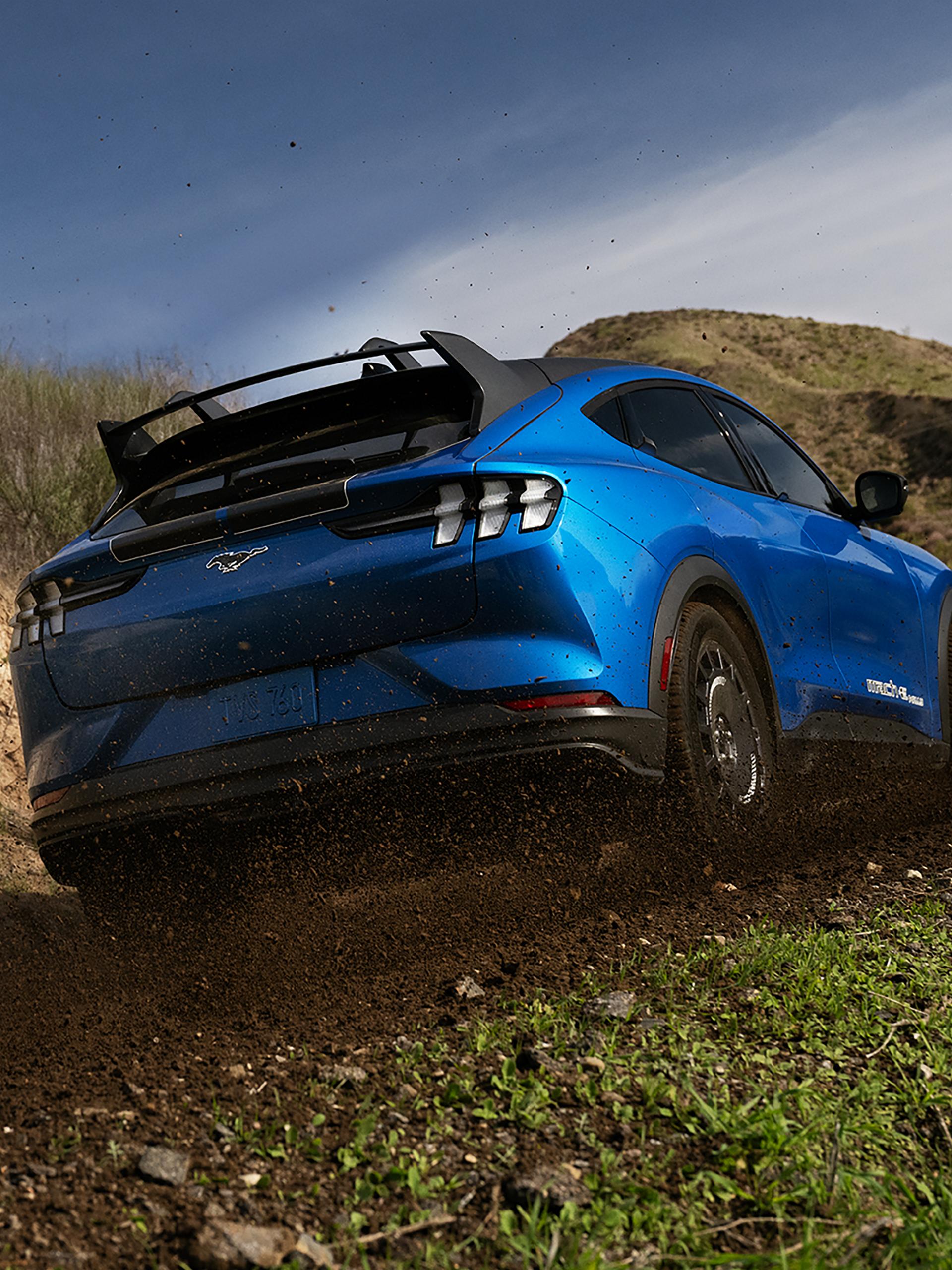 2025 Ford Mustang Mach-E® Rally vehicles on dirt road