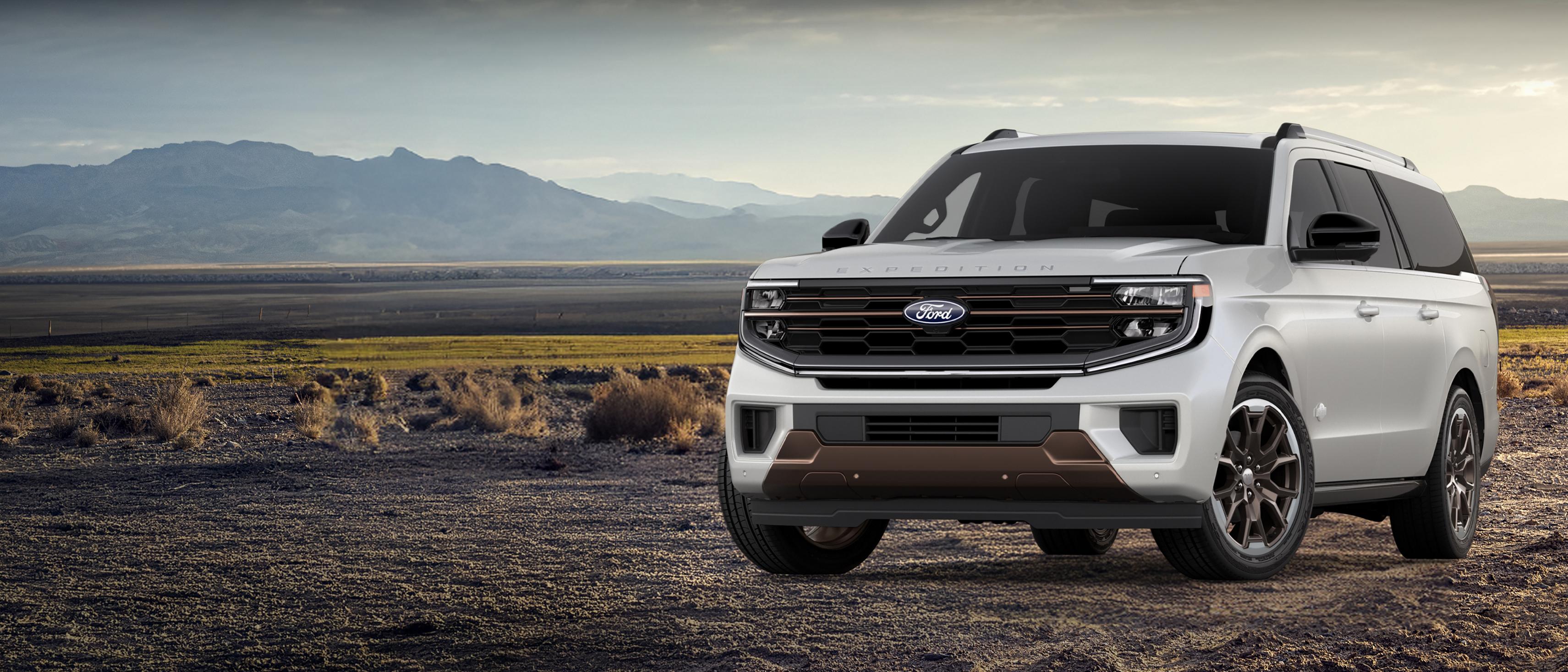 2026 Ford Expedition® MAX King Ranch® SUV with extra-cost color option shown parked in the wilderness