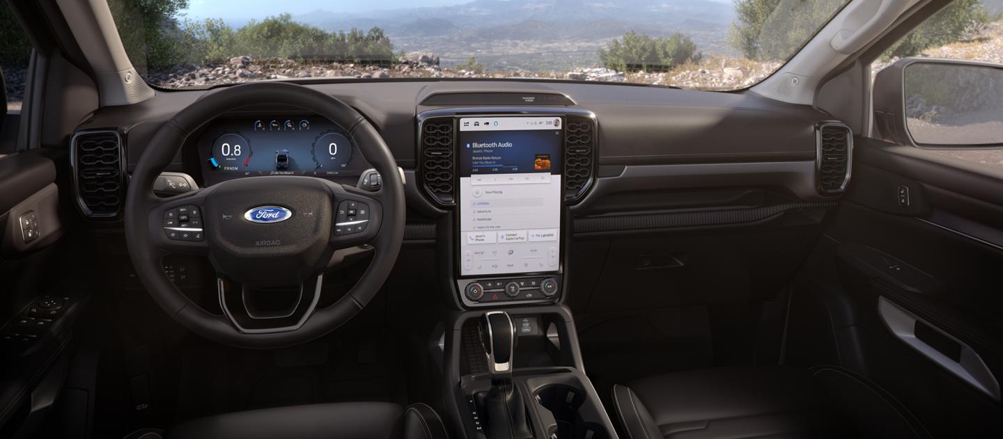 Interior view of the 2026 Ford Ranger® Lariat® highlighting the center display and cluster display