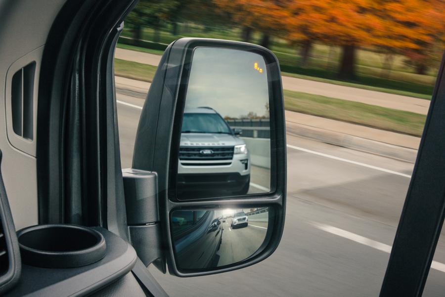 2025 Ford Transit® model passenger-side mirror showing the Blind Spot Assist