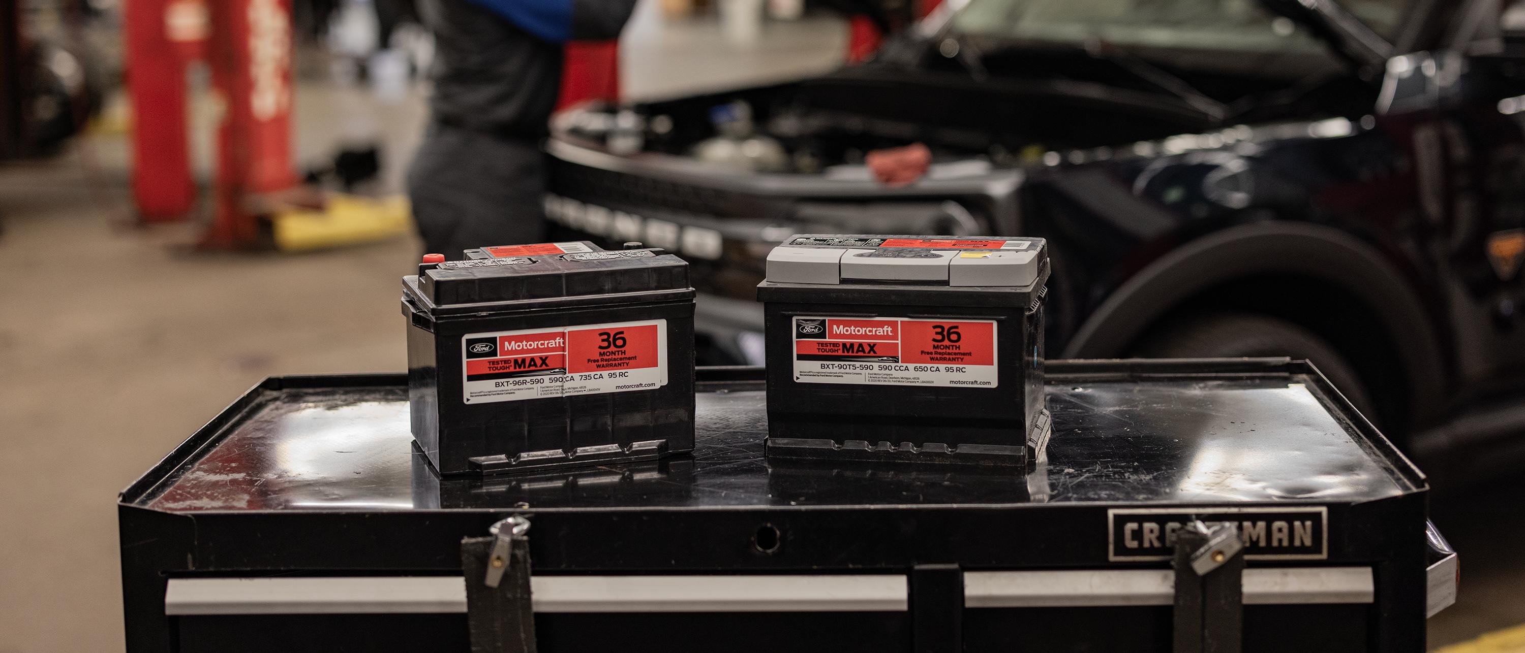 Two Motorcraft® batteries on a table