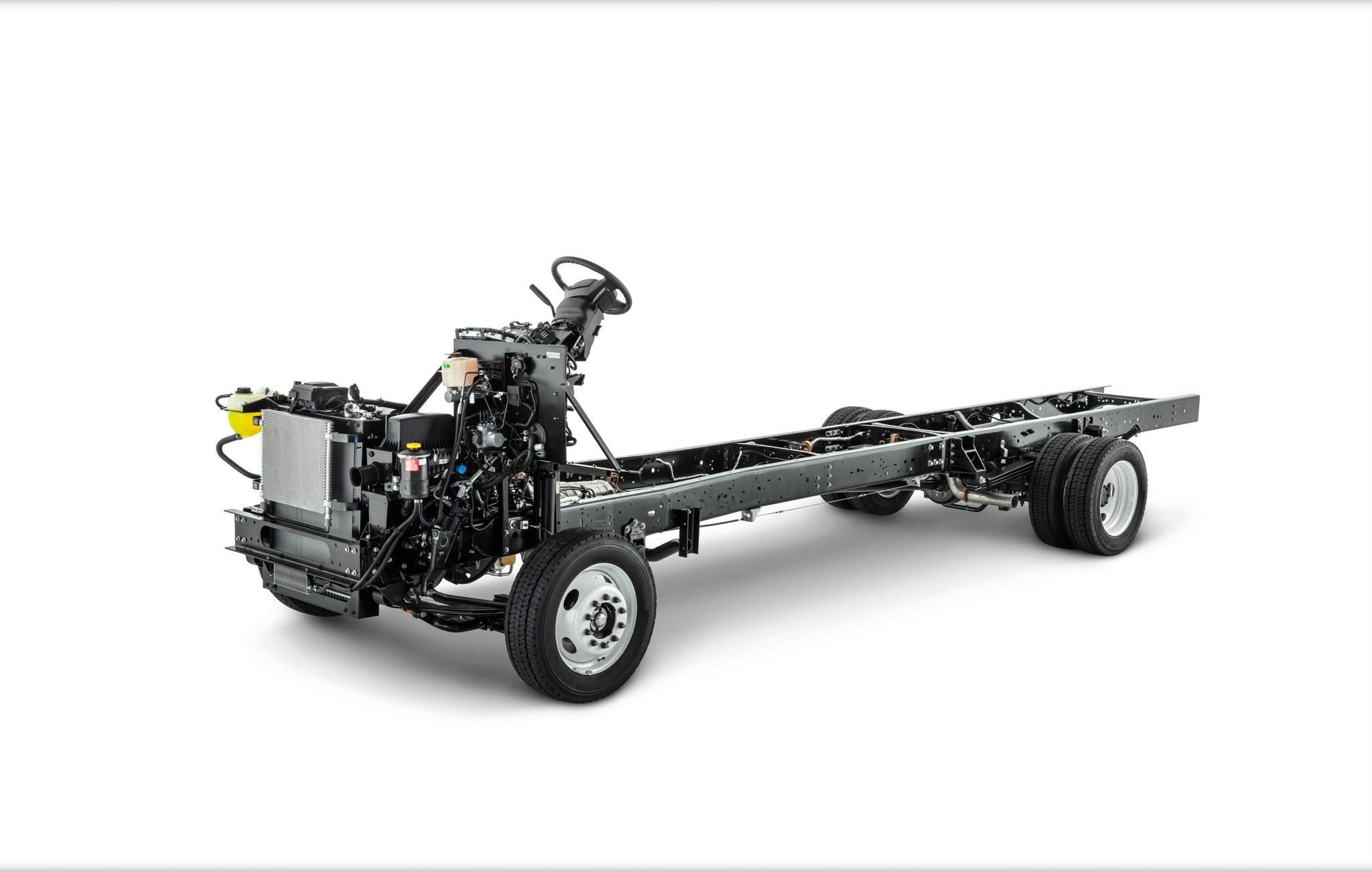 Side view of a 2024 Ford F-59 Commercial Stripped Chassis on a white background