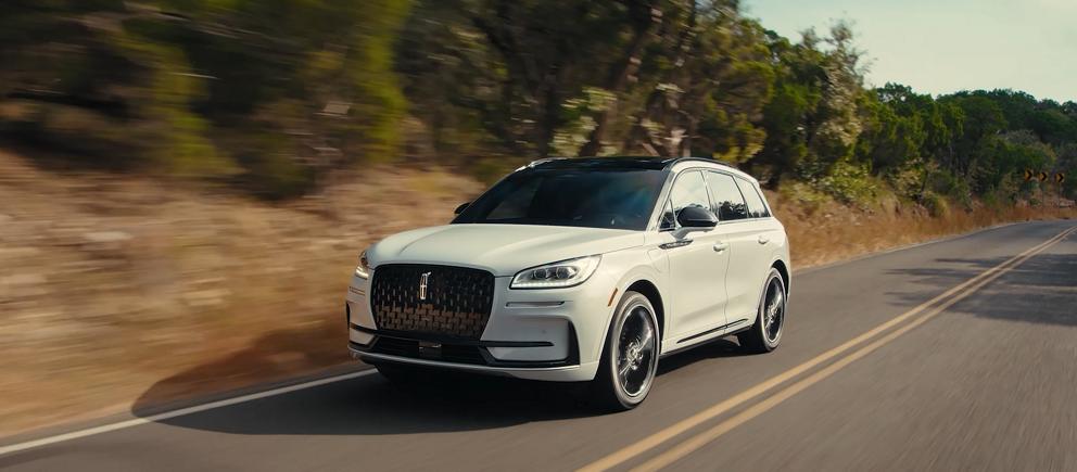 A 2026 Lincoln Corsair with the available Jet Apperance Package is being driven