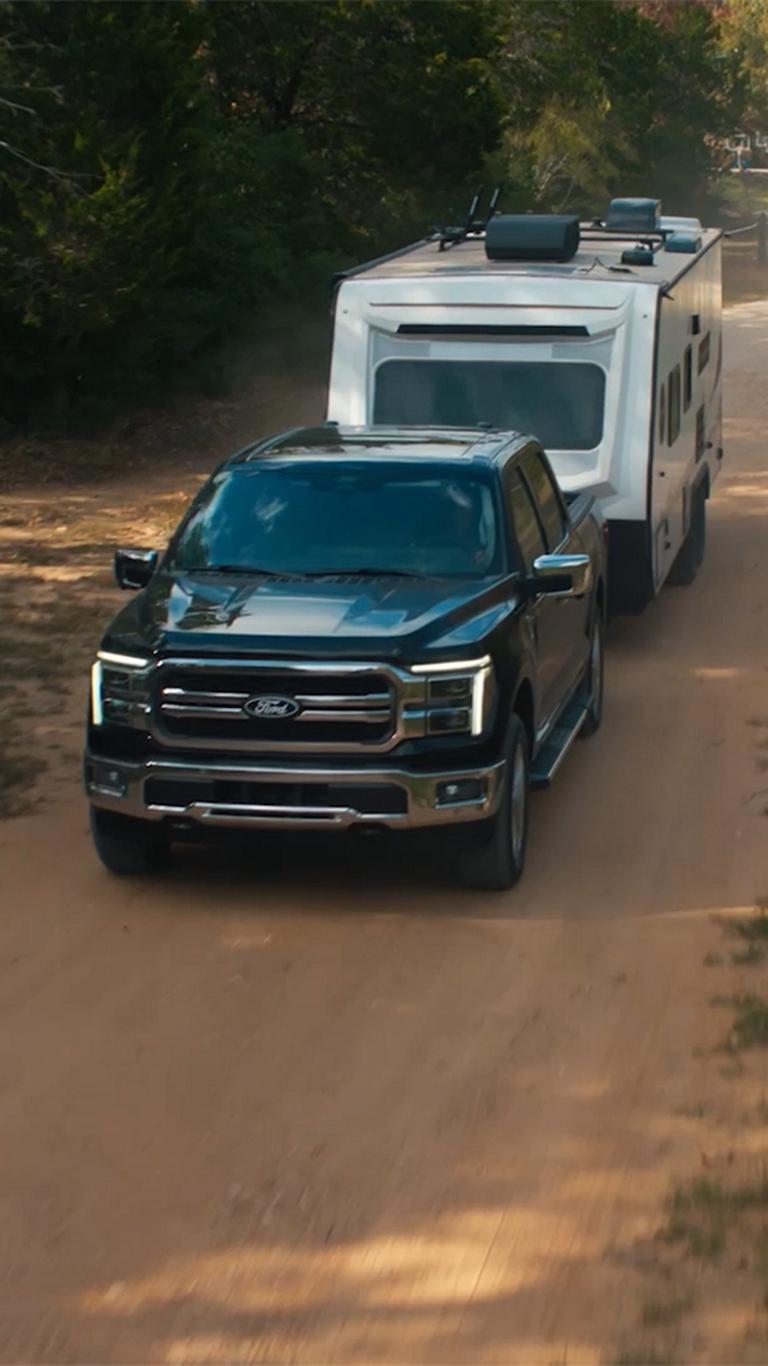 2026 Ford F-150® towing a camper