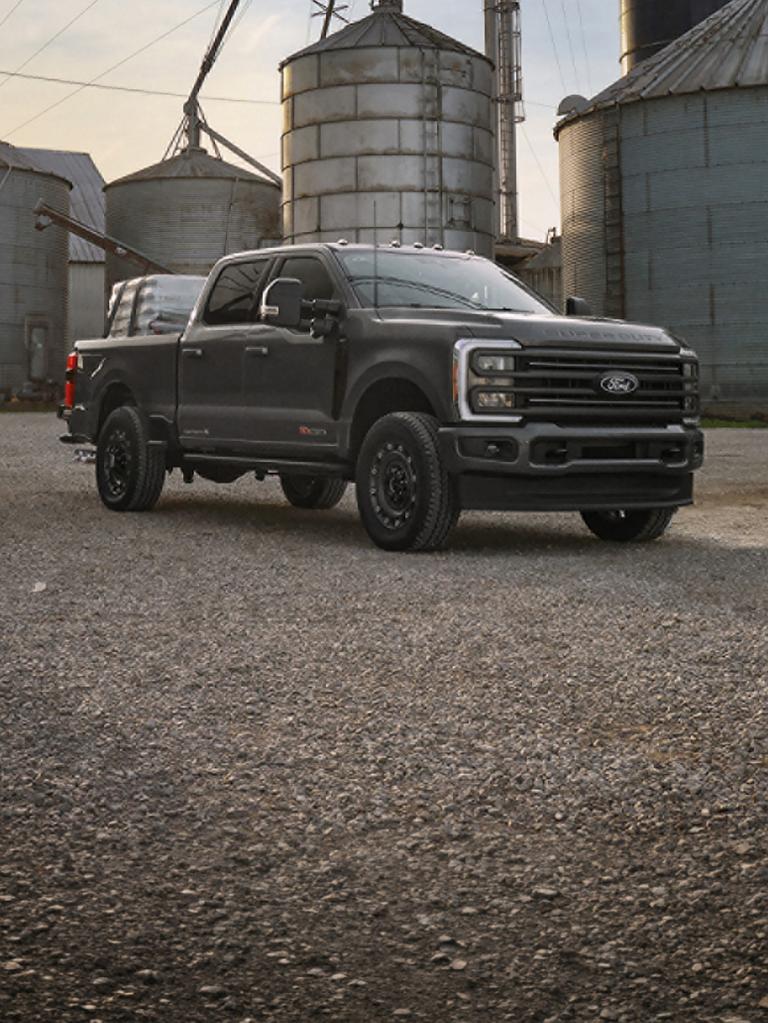 2027 Ford Super Duty® F-350® XLT model with the Super Duty Carhartt® Package parked on a construction site