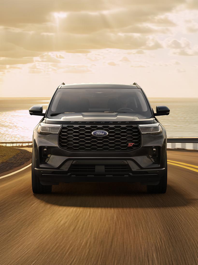 The 2026 Ford Explorer® ST SUV being driven on a coastal highway