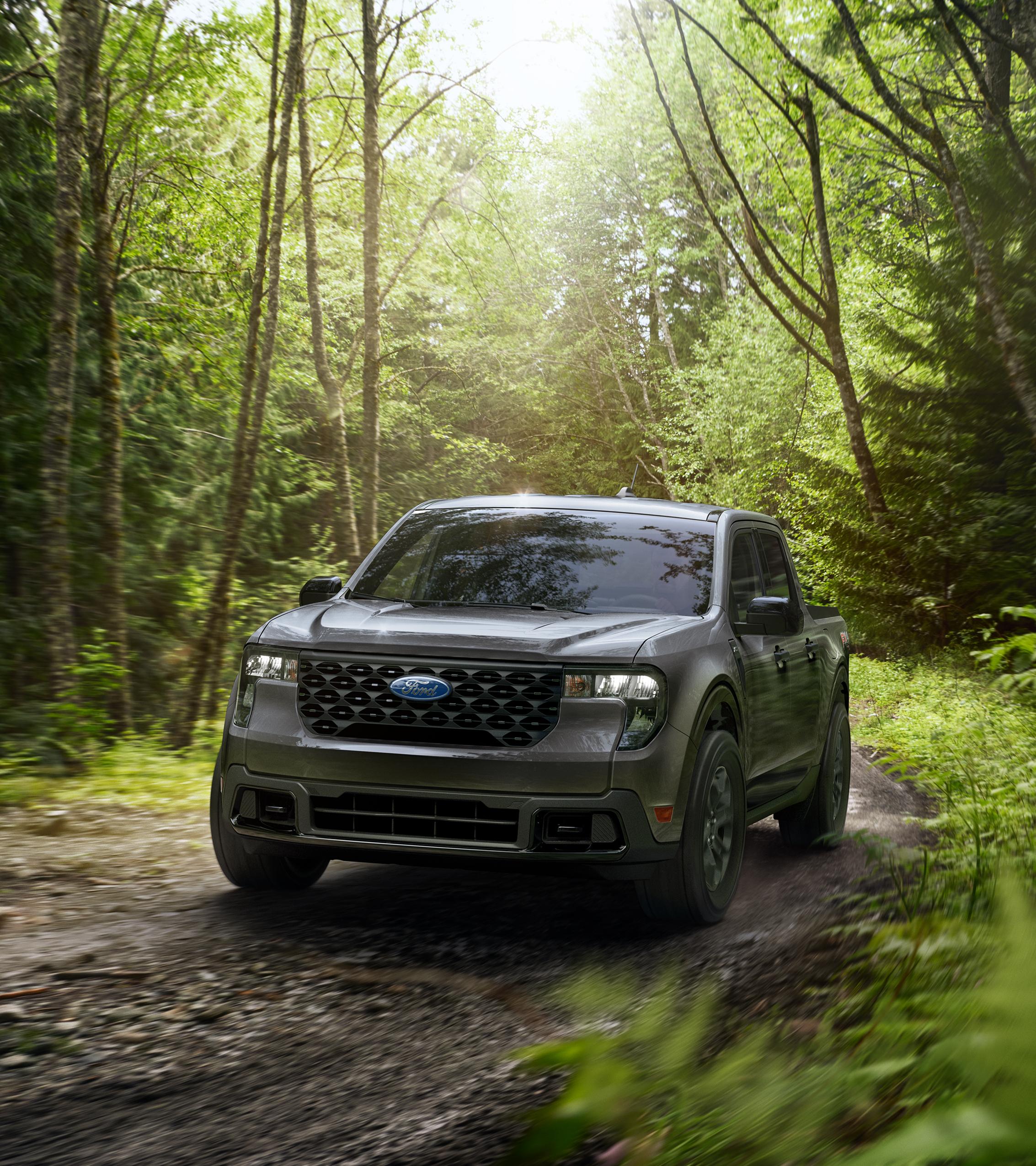 2026 Ford Maverick® FX4 Off-Road Package model being driven through a forest