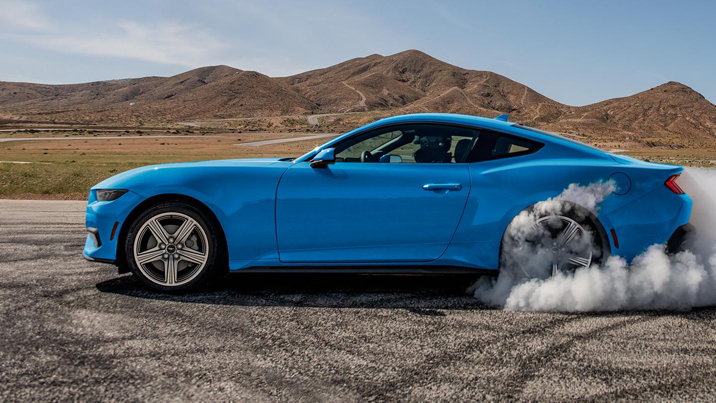 2026 Ford Mustang® EcoBoost® fastback in with a driver doing burnouts on a closed course 