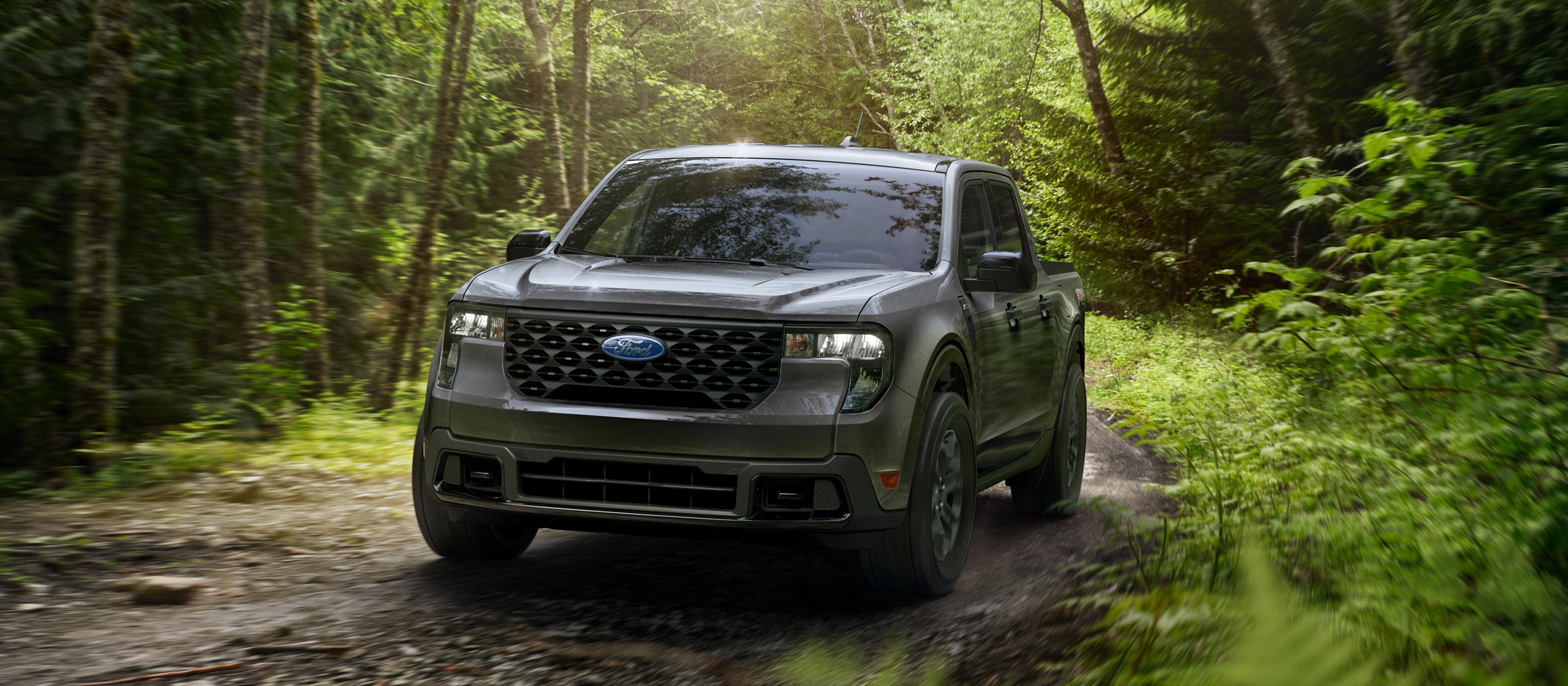 2026 Ford Maverick® FX4 Off-Road Package model being driven through a forest
