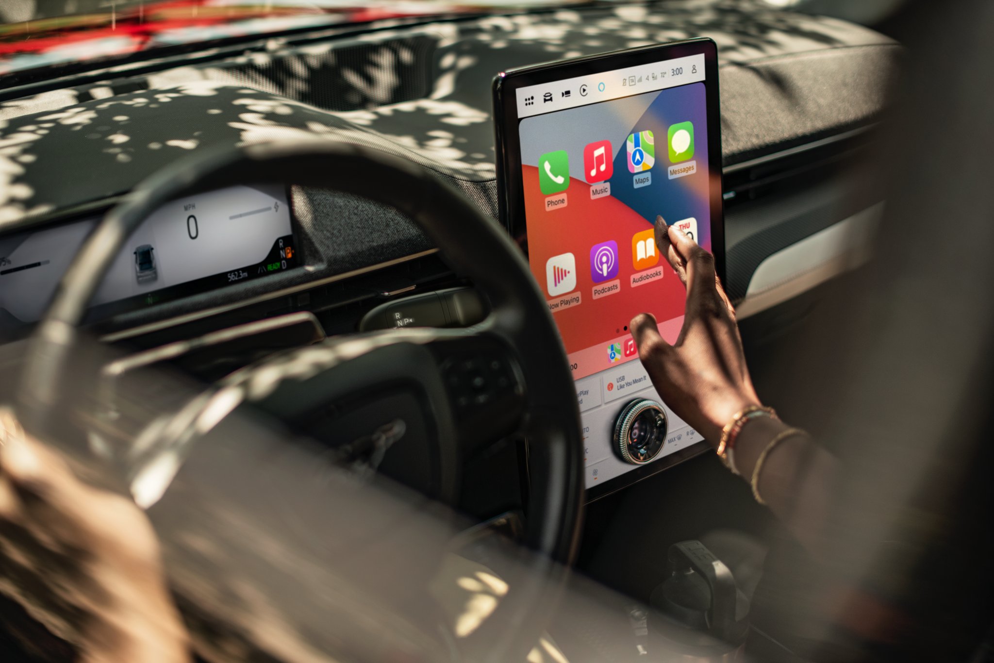 Steering wheel and touchscreen in a 2025 Ford Mustang Mach-E®