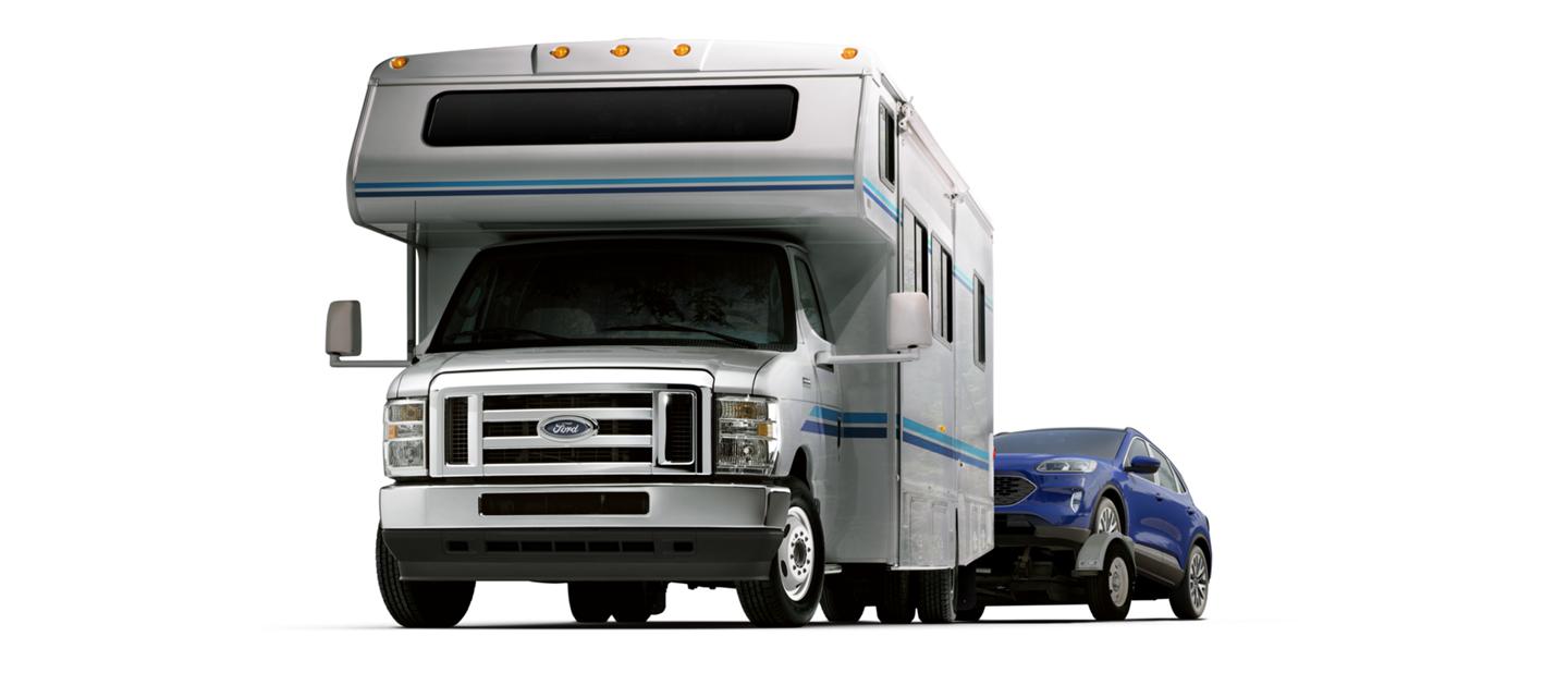 2025 Ford E-Series Cutaway with Class C Motorhome towing a car
