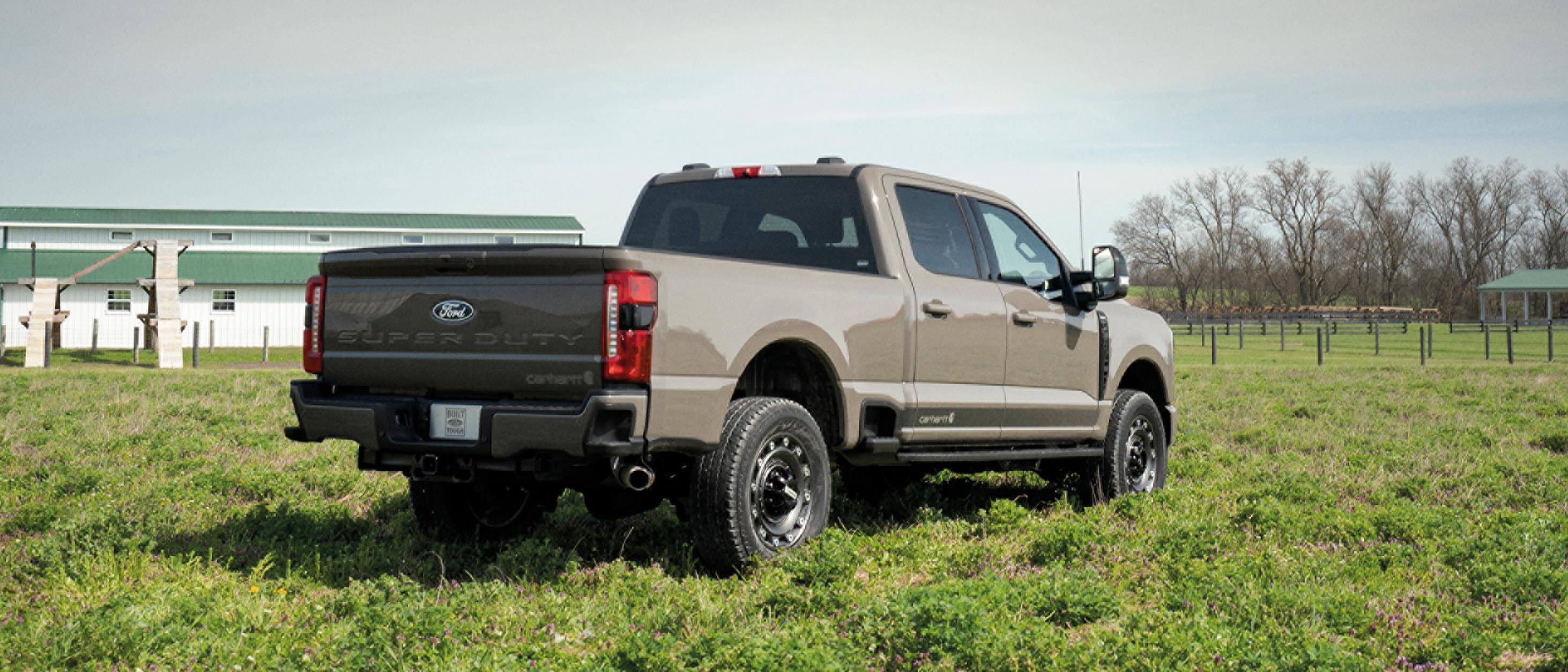 2027 Ford Super Duty® F-250® XLT model parked on a grassy farm