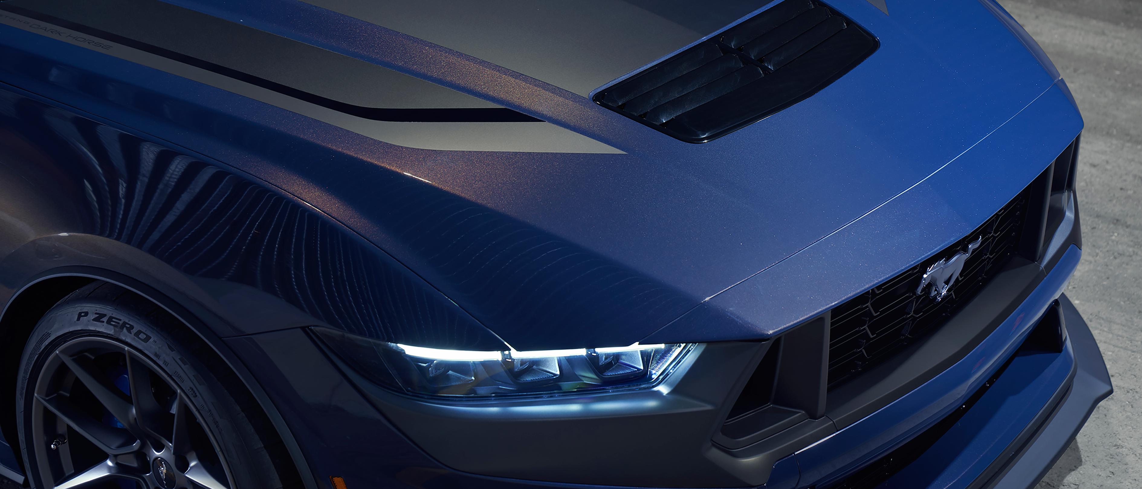 2026 Ford Mustang Dark Horse® headlamps and coupe hood in available Blue Ember Metallic