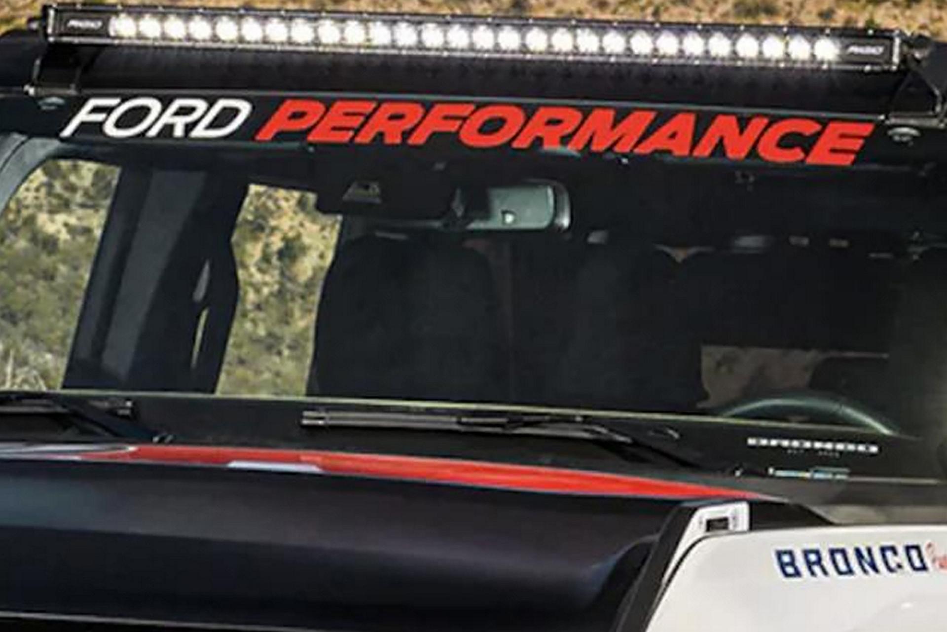 A windshield featuring Ford Performance accessories