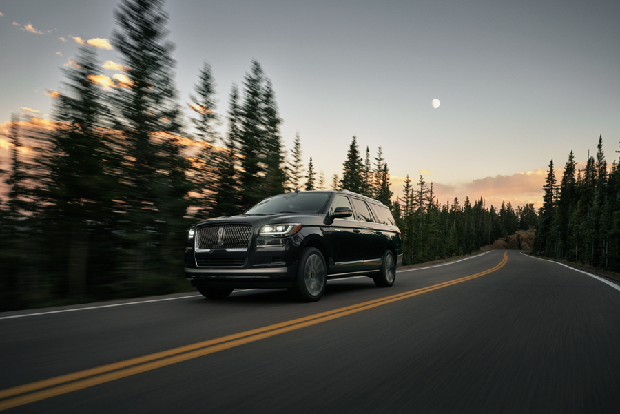 A 2025 Lincoln Aviator® is shown being driven along river valley