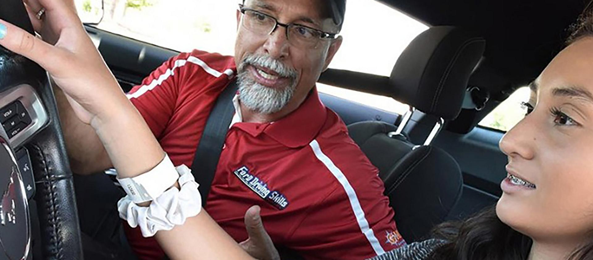 Driving instructor and student driver