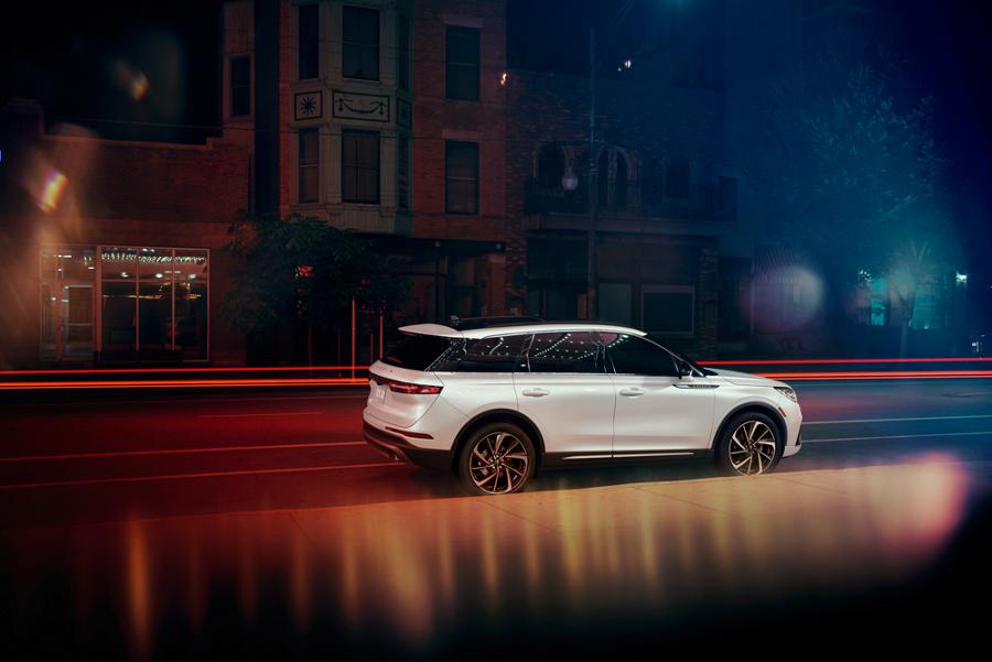 A 2026 Lincoln Corsair is parked in the city at night
