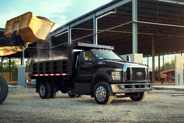 2026 Ford F-750® Regular Cab in Agate Black with dump truck upfit at work site