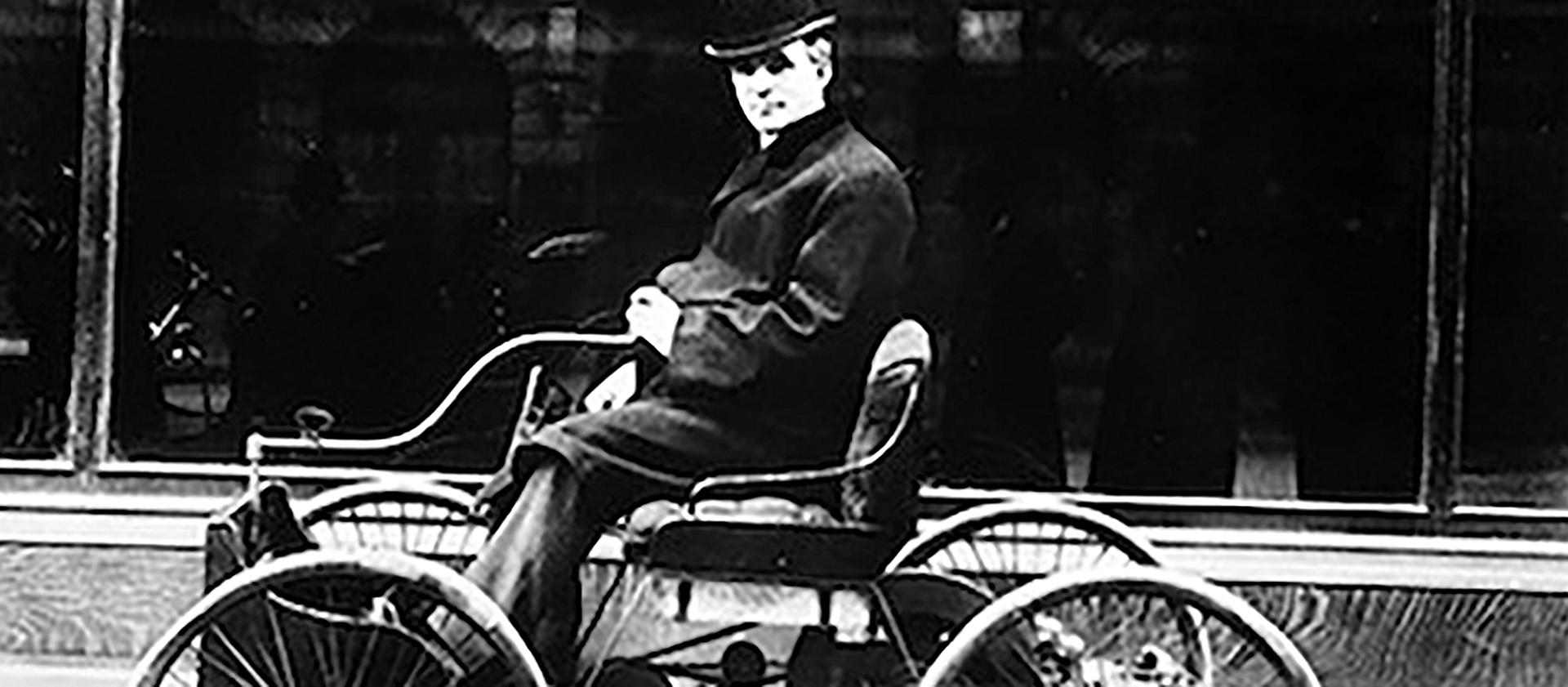 Image of Henry Ford on a quadricycle