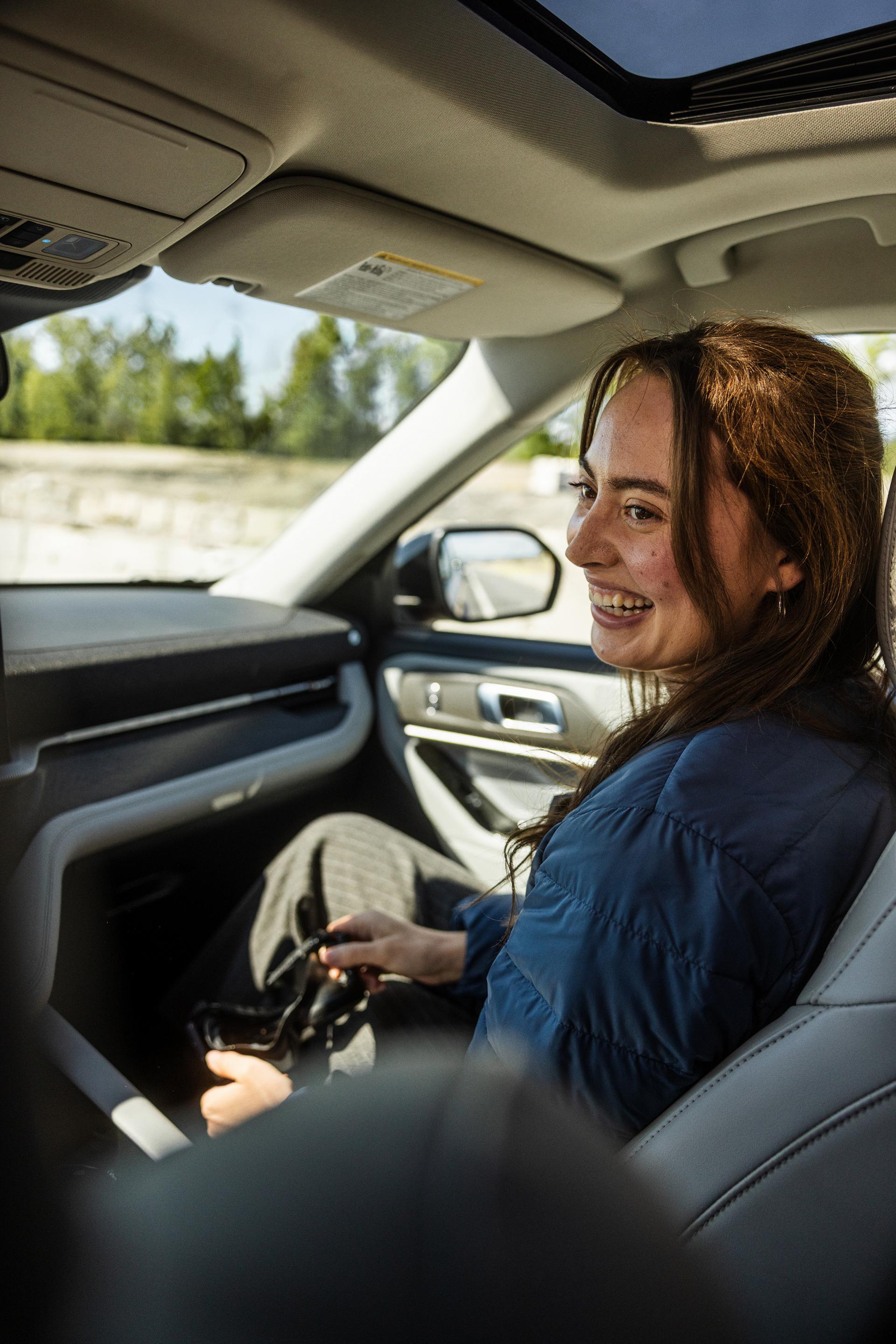 A women in the passenger seat of a 2026 Ford Explorer®