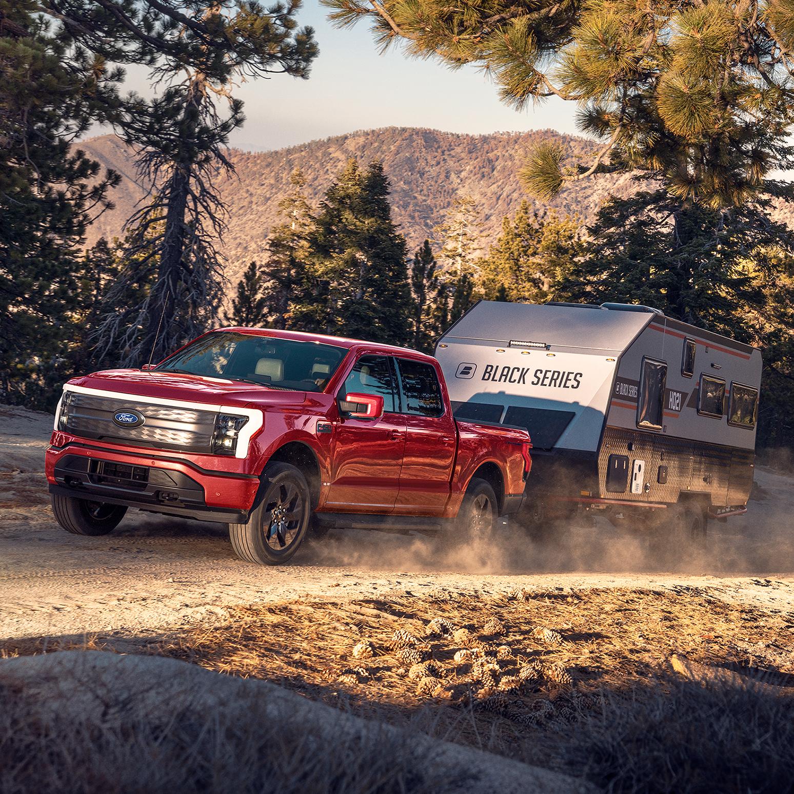 2025 Ford F-150® Lightning® towing a camper