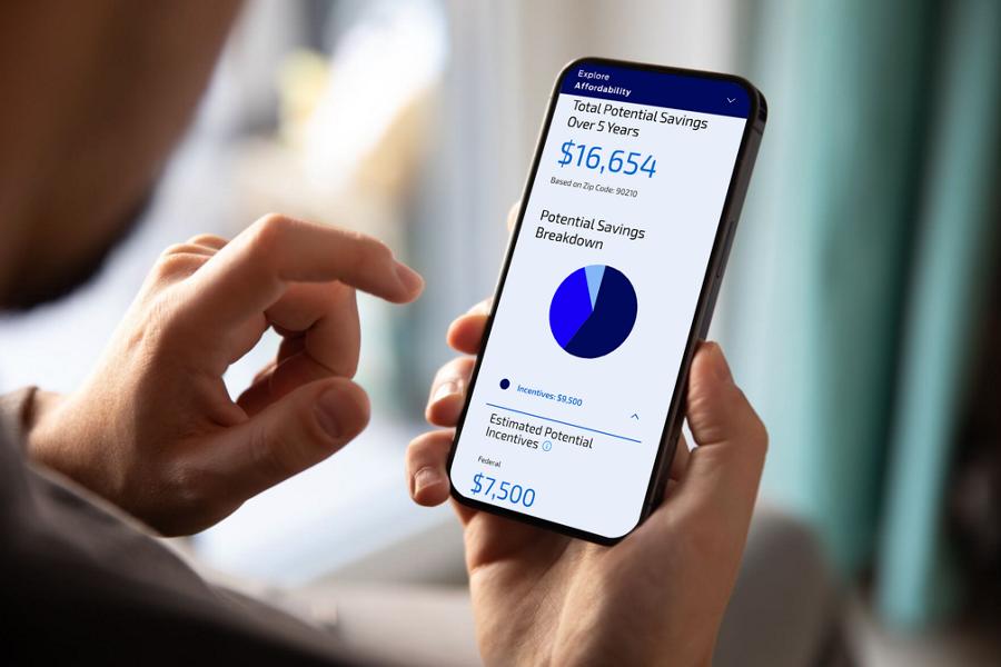 The electric vehicle total cost of ownership tool displayed on a smartphone
