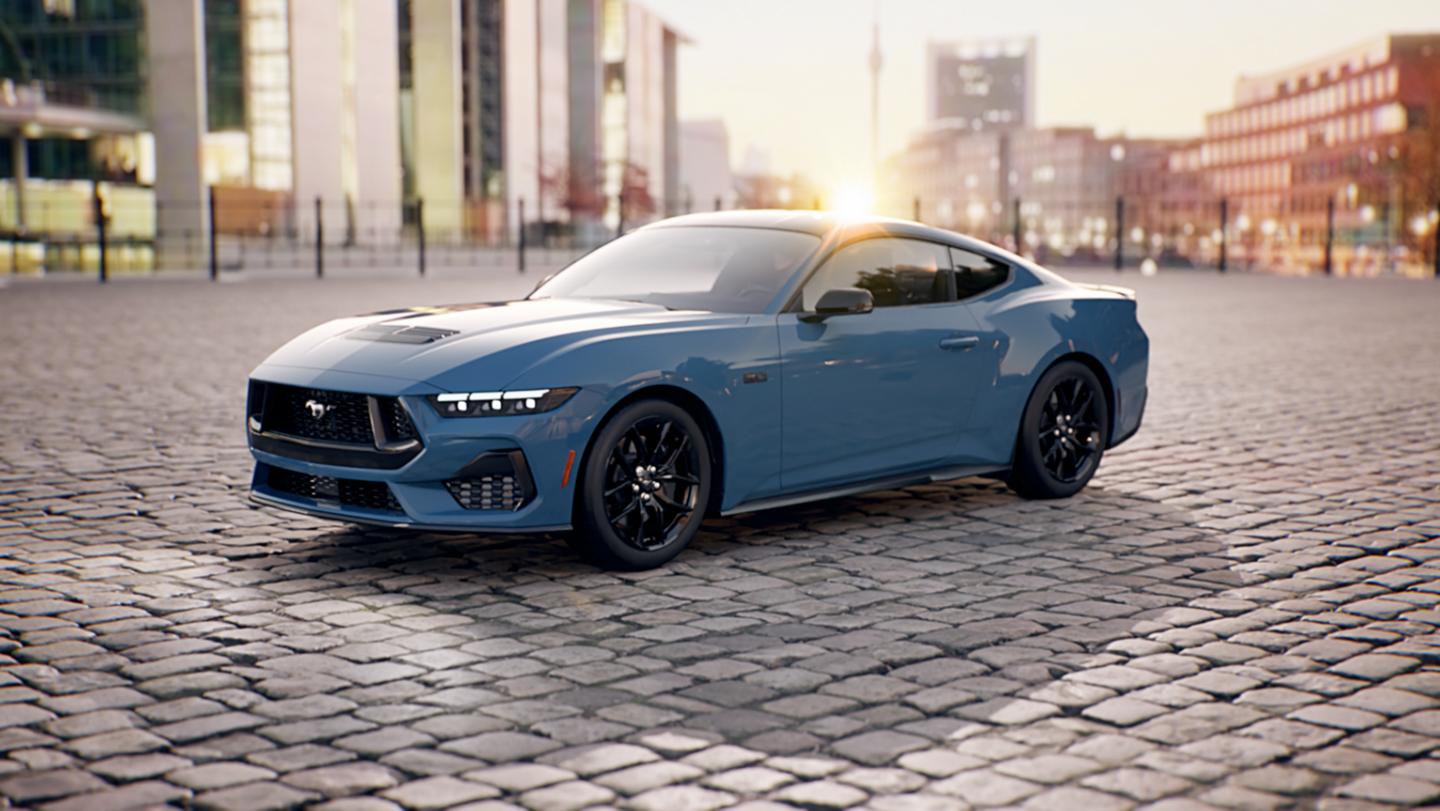 A 2026 Ford Mustang® GT Premium Fastback parked in a downtown plaza