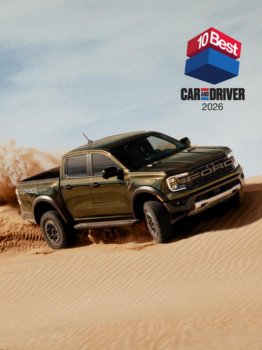 2026 Ford Ranger® Raptor® model driving through a desert. Car and Driver 10Best 2026 logo in the upper right corner
