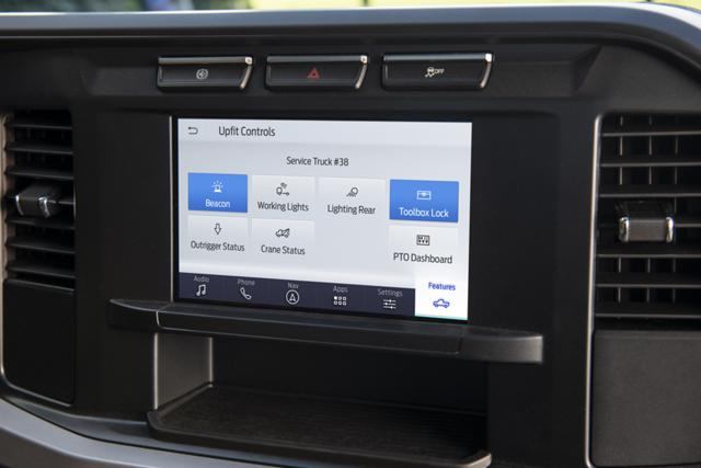 Close-up of the center touchscreen showing upfit icons