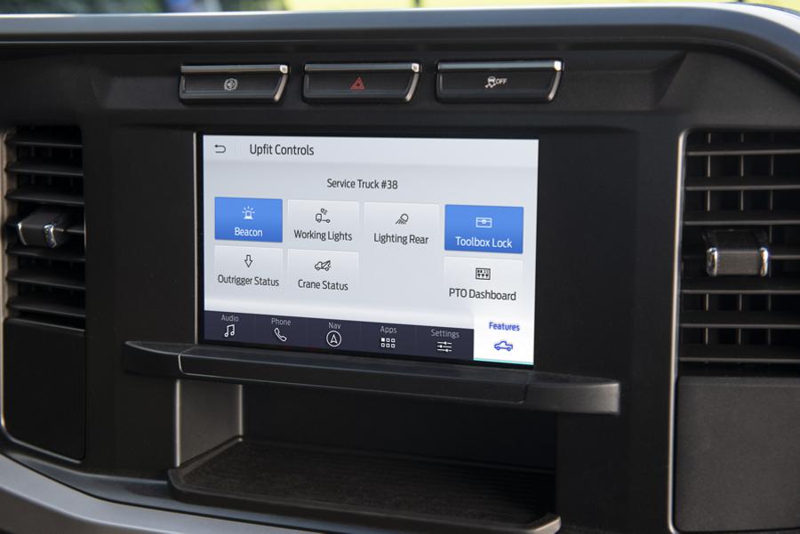 Close-up of the center touchscreen showing upfit icons