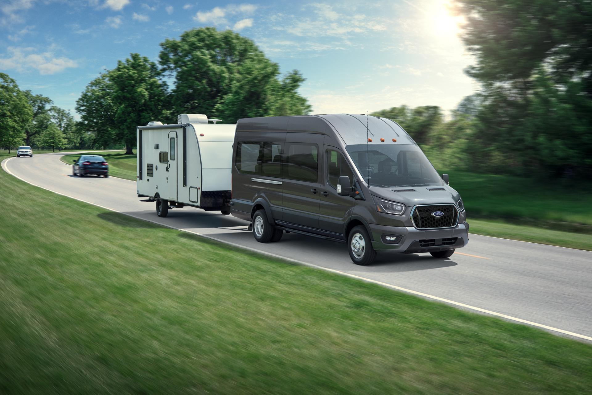 A 2026 Ford Transit® van towing a trailer