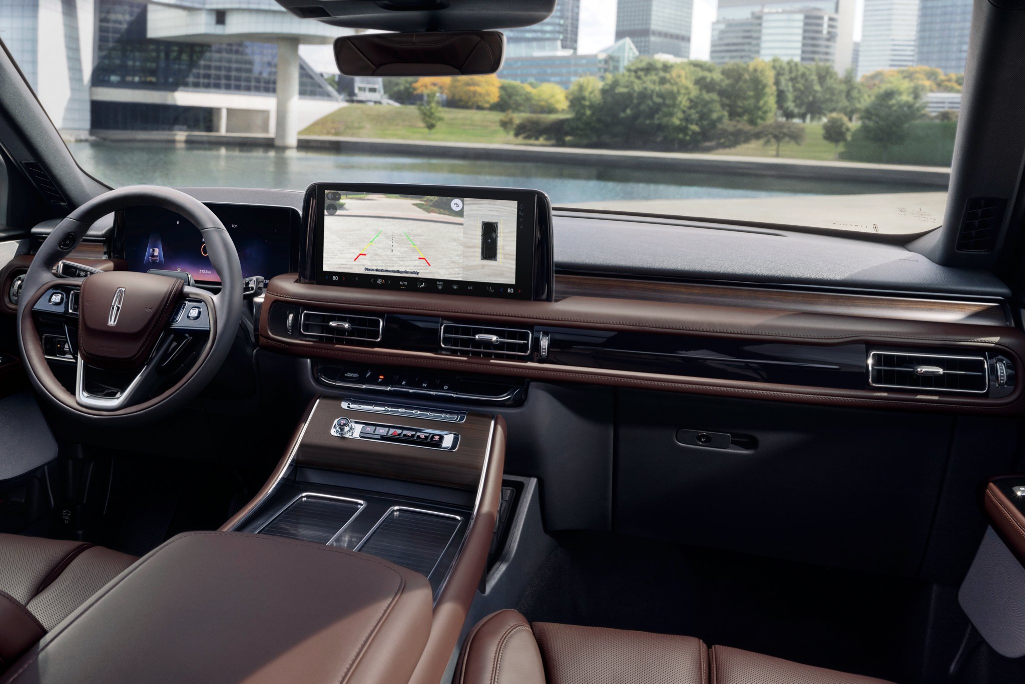 The center touchscreen inside a 2025 Lincoln Aviator® SUV displays the rear camera view.