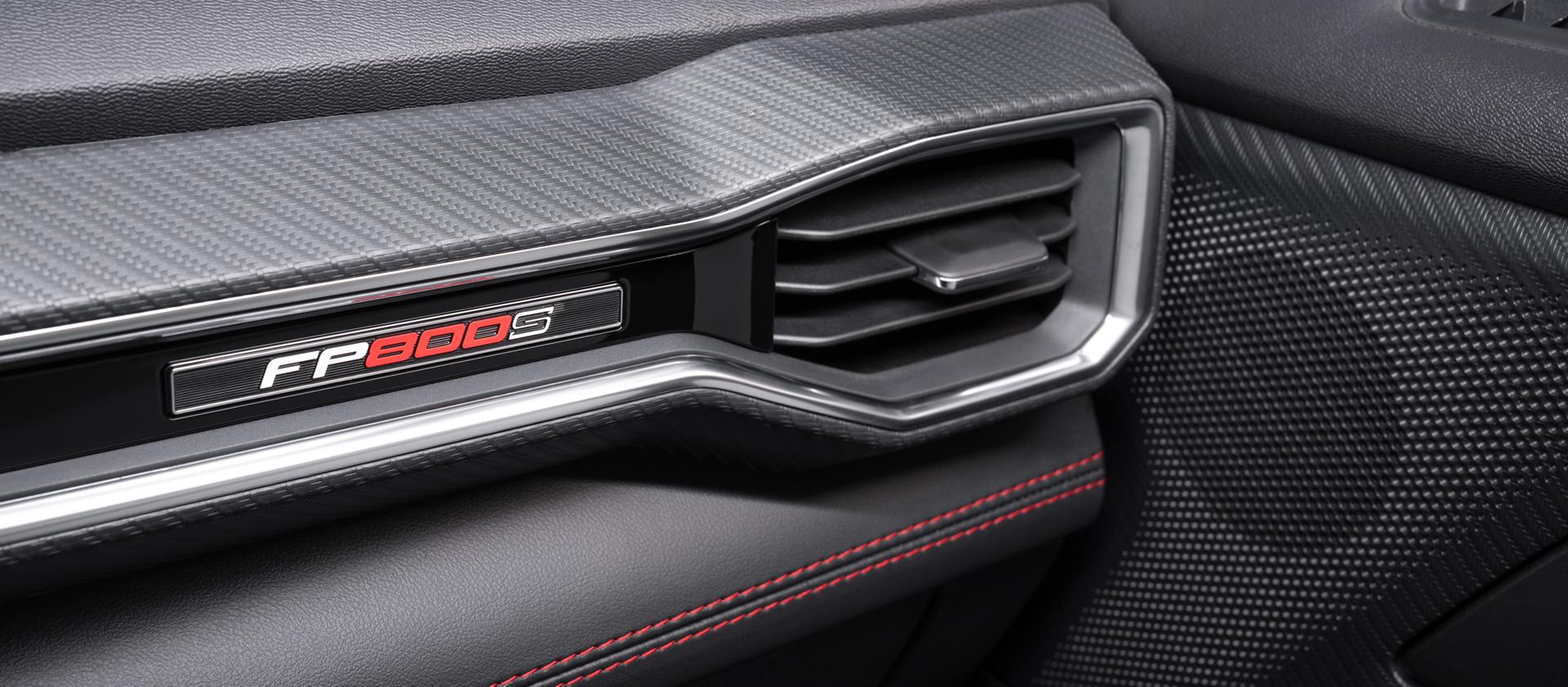Interior dashboard trim detail with the FP800S badge