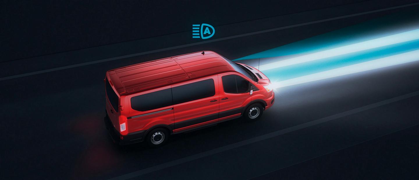 Illustration of a 2025 Ford Transit® van at night with high-beam headlamps on
