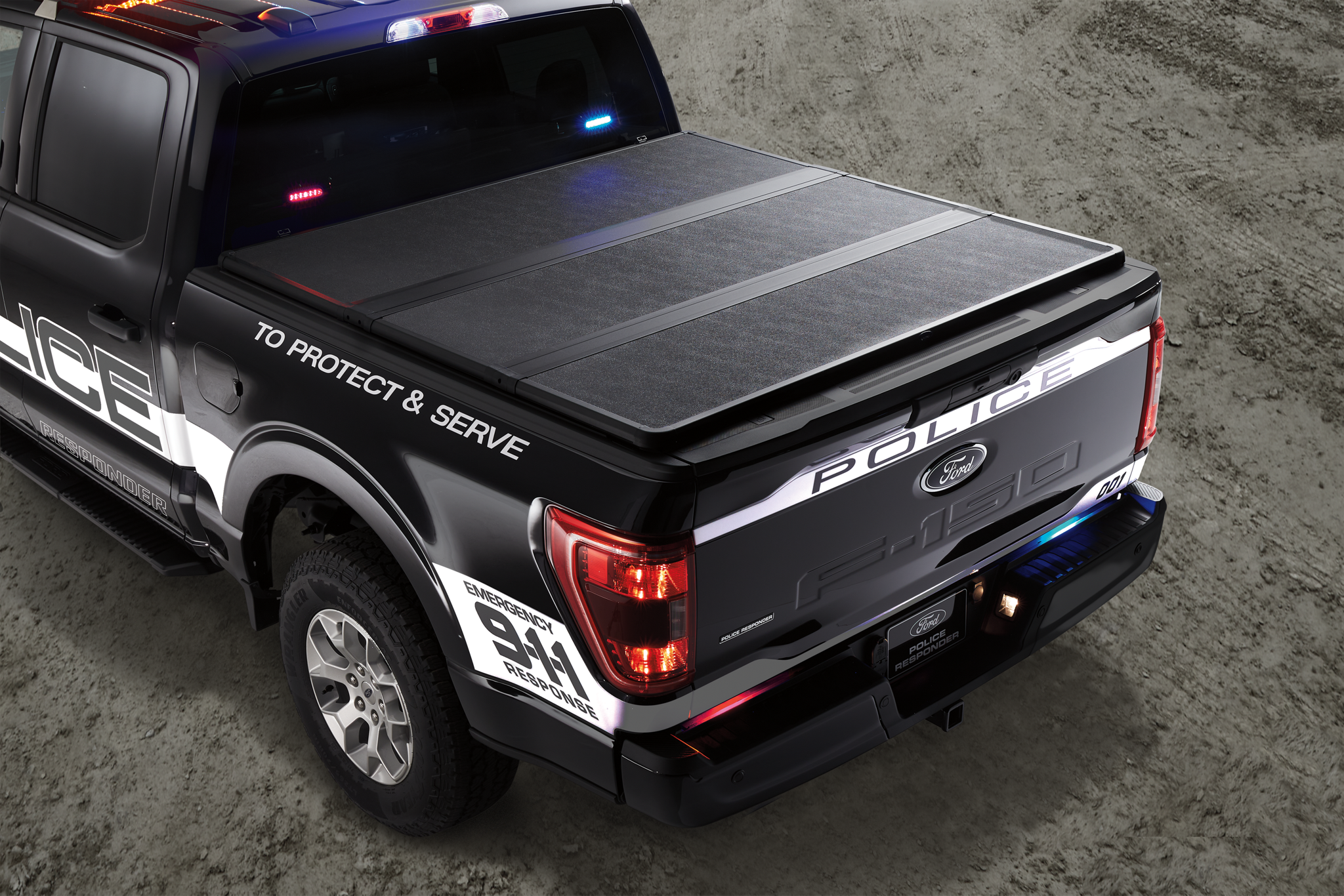 The bed of a 2021 Ford F-150 Police Responder® with a tonneau cover