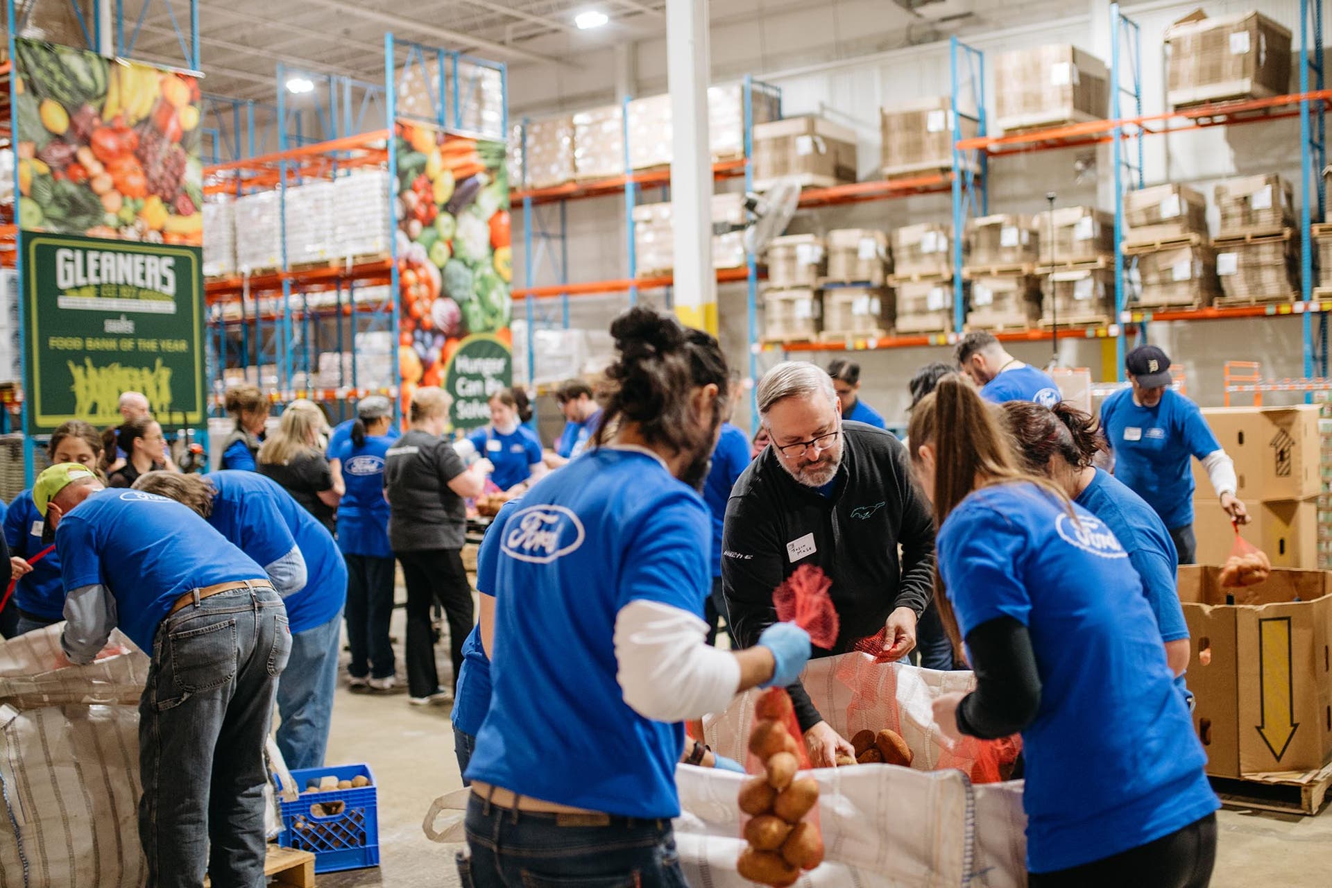 People packing boxes at a food bank