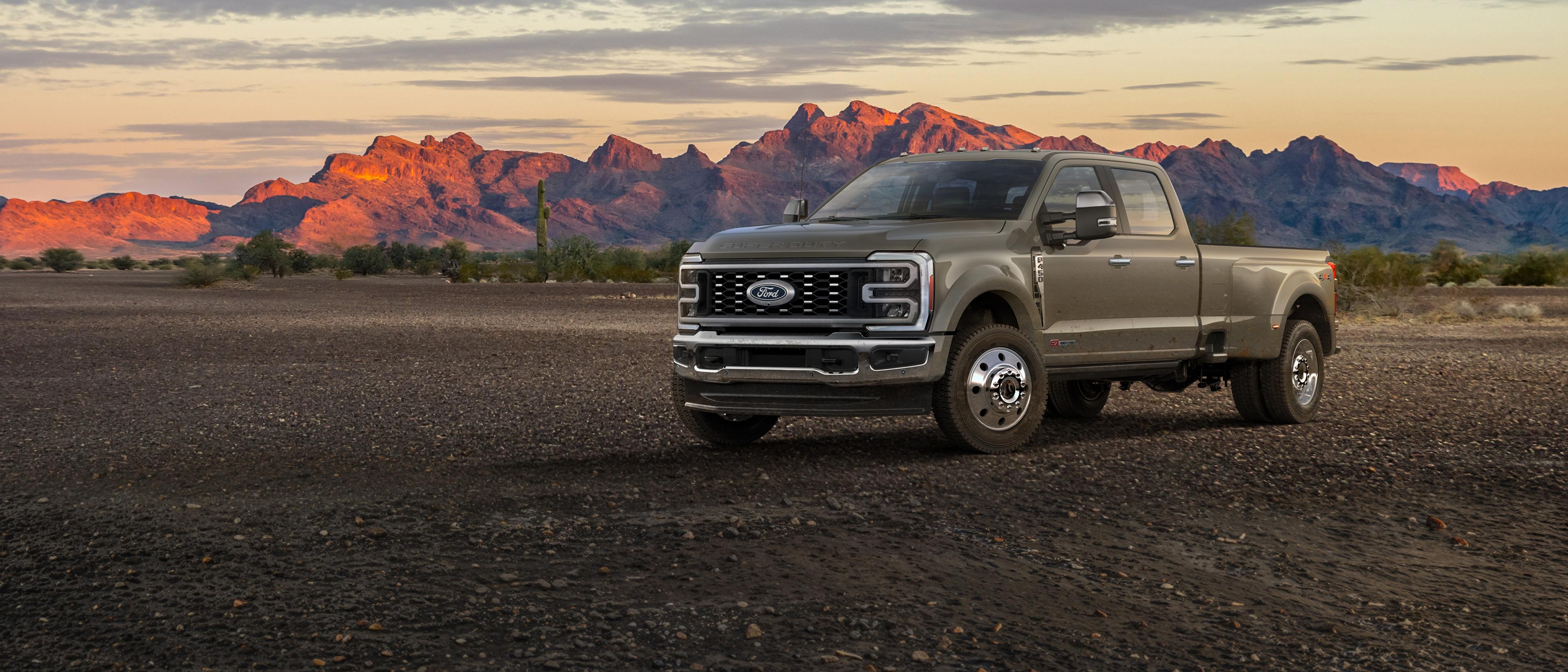 2027 Ford Super Duty® F-450® King Ranch® truck parked on a dirt road in the mountains