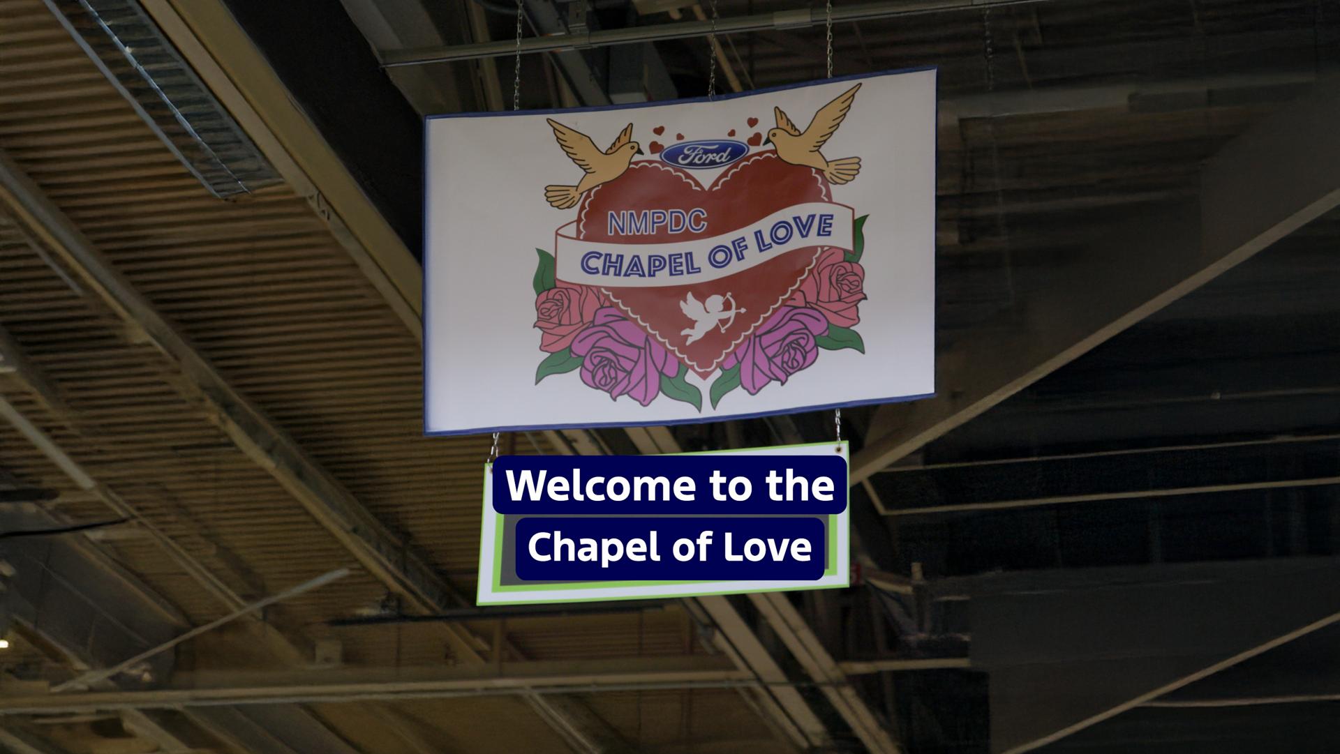A hanging banner that reads NMPDC chapel of love