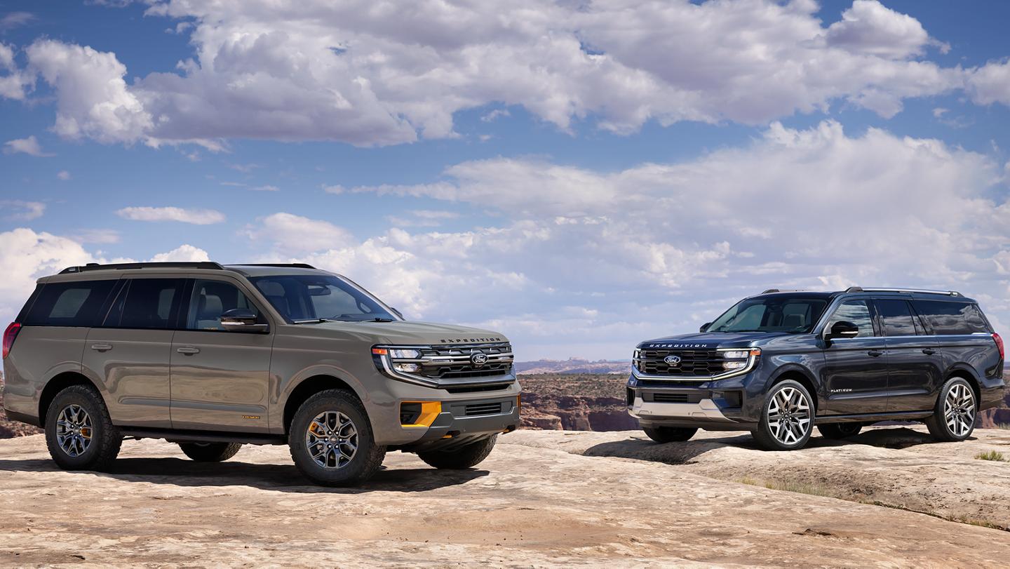 A 2026 Ford Expedition® Tremor® and another Expedition model parked on a rocky outcrop