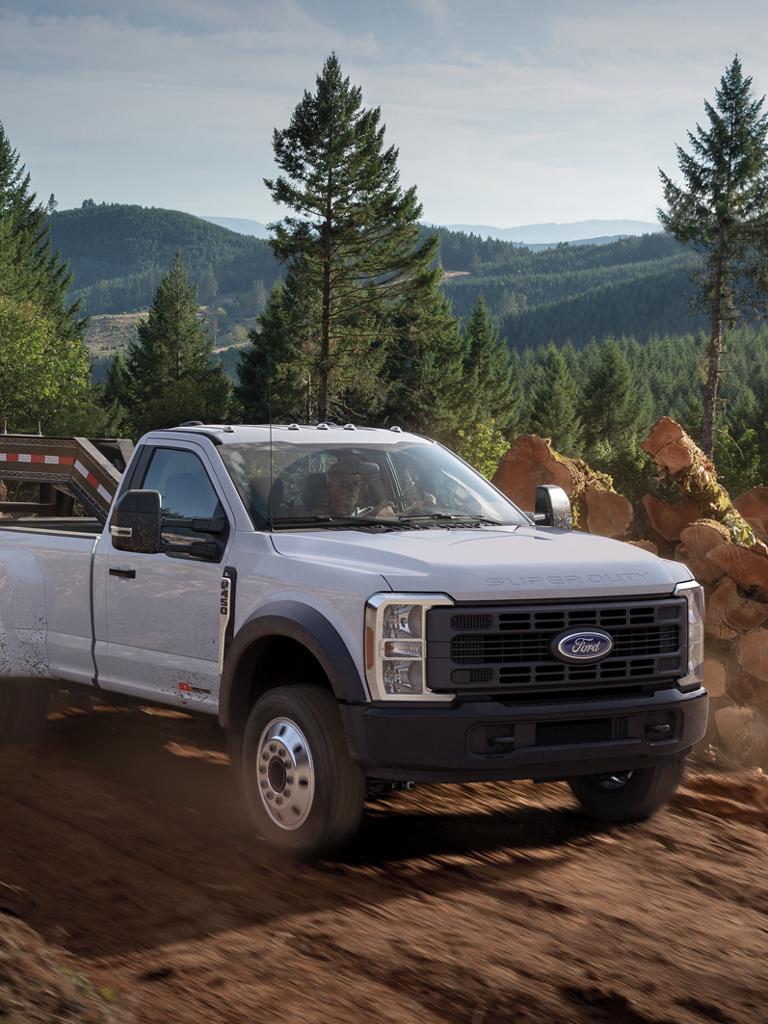 2026 Ford Super Duty® F-450® XL model with the STX® Appearance Package being driven on a dirt road
