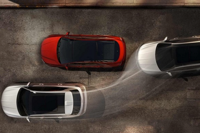 a Lincoln vehicle steering around another vehicle is shown here 