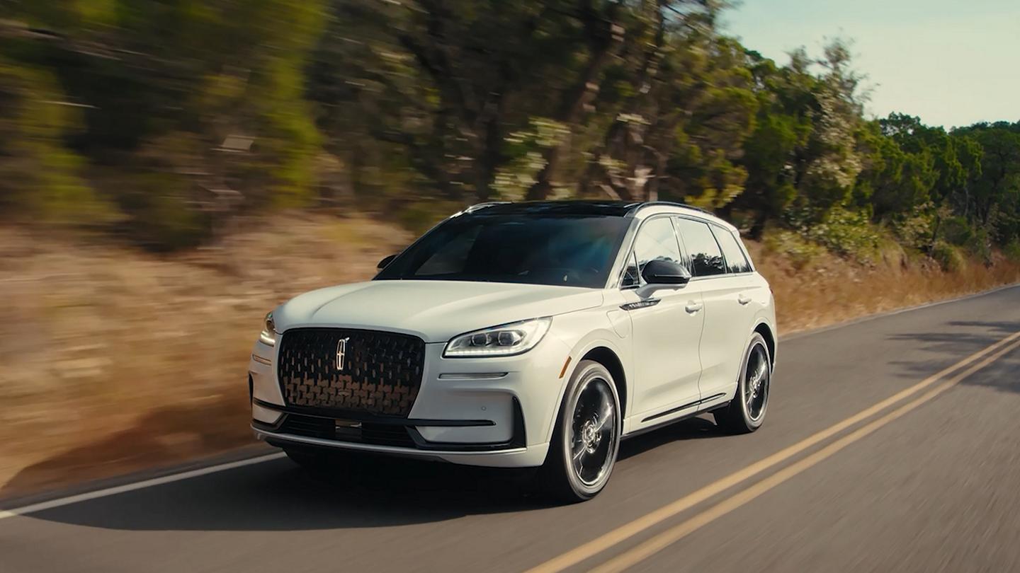 A 2026 Lincoln Corsair® with the available Jet Appearance Package is being driven