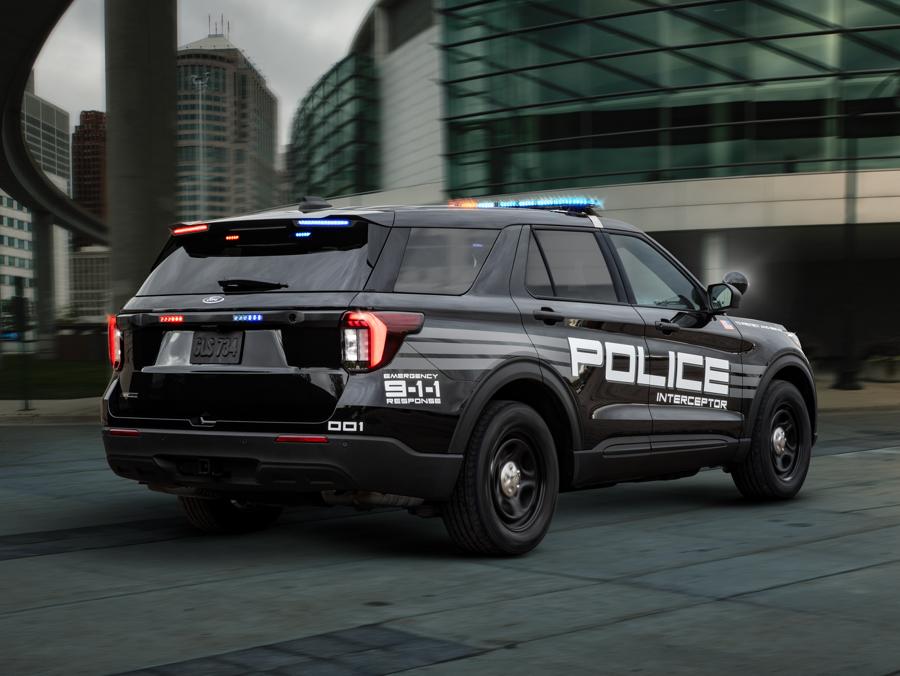 A 2025 Ford Police Interceptor® Utility parked near an urban building