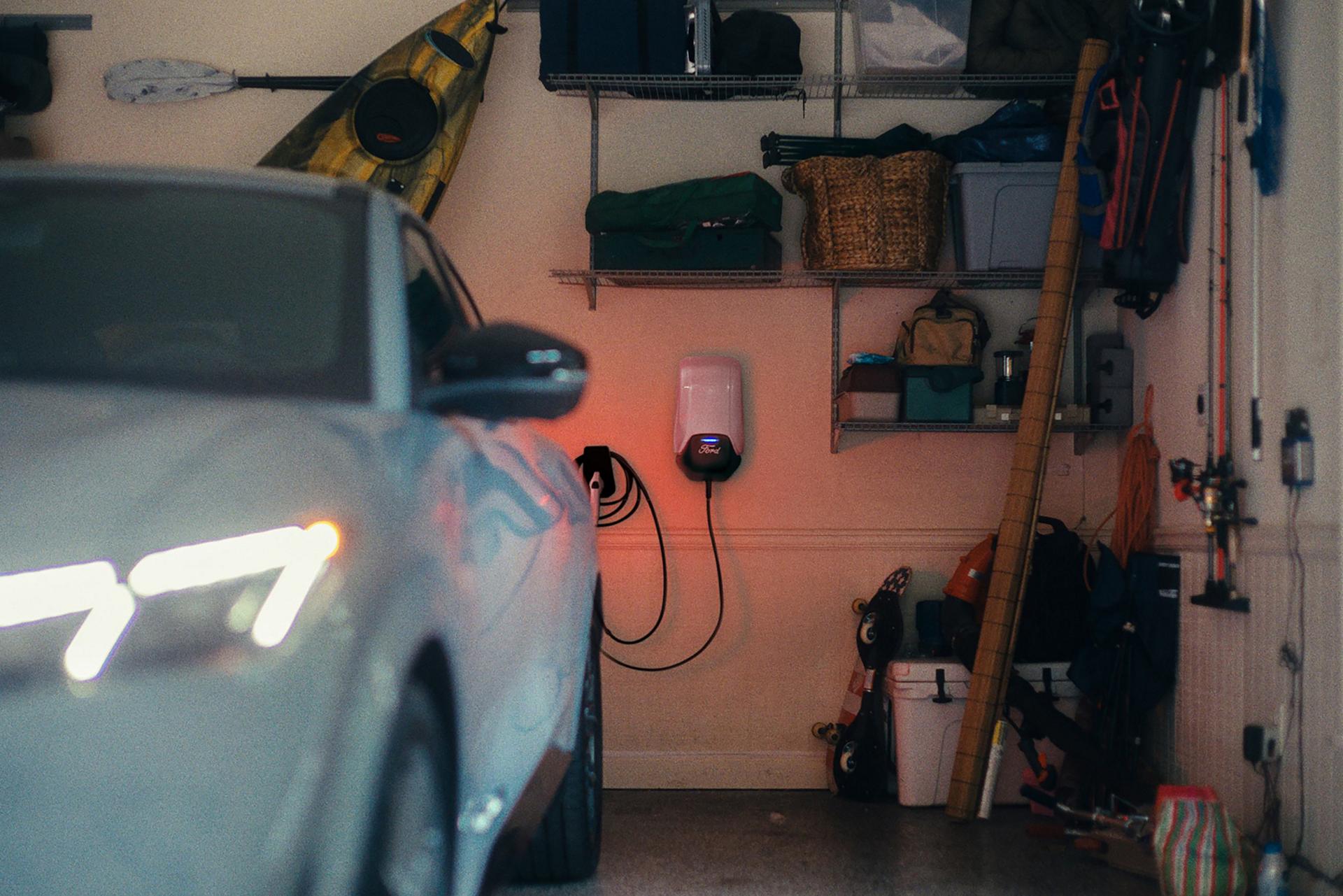 2026 Ford Mustang Mach-E® SUV charging in a garage
